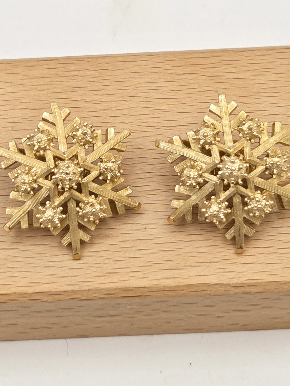 Vintage Crown Trifari Gold Tone Snowflake Clip On Earrings Textured Statement